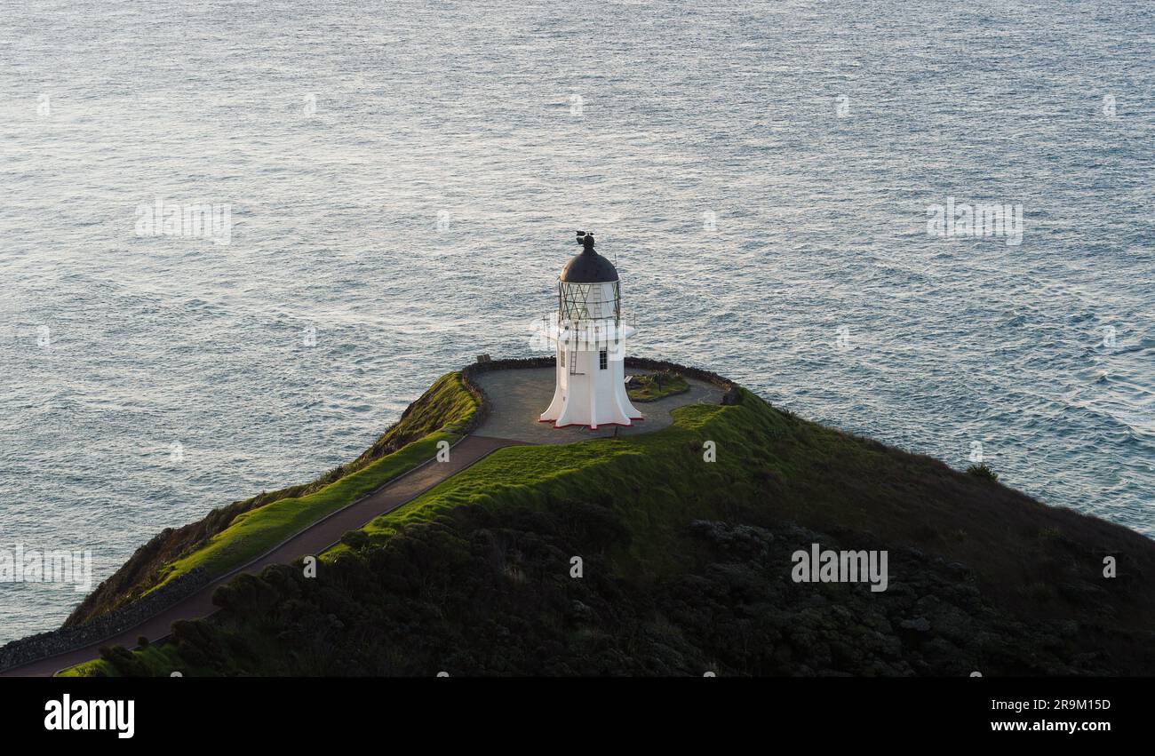 Panoramic view of historic white lighthouse landmark perched on
