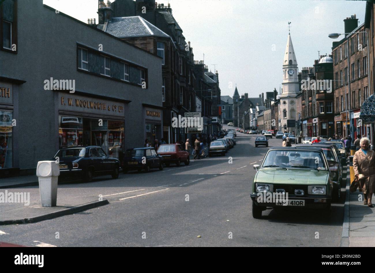 Campbeltown, Scotland, United Kingdom - July 1983: Intersection of Main Street and Shore Street. View of Woolworths store Stock Photo