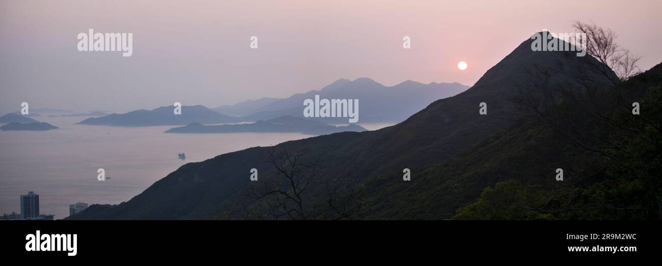 Panoramic view taken from the peak in Hong Kong Island at sunset. Stock Photo