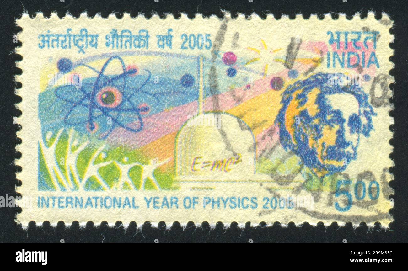 INDIA - CIRCA 2005: stamp printed by India, shows Albert Einstein, Atom sign, human figures, equation, circa 2005 Stock Photo