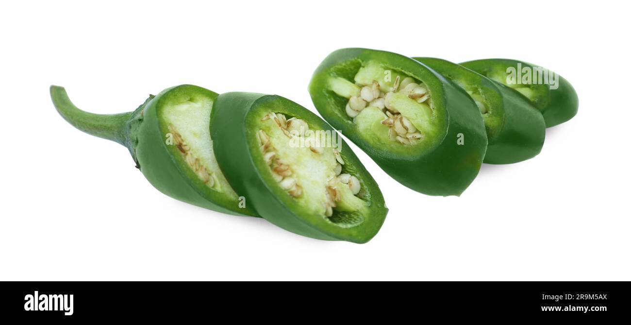 Cut green hot chili pepper isolated on white Stock Photo - Alamy