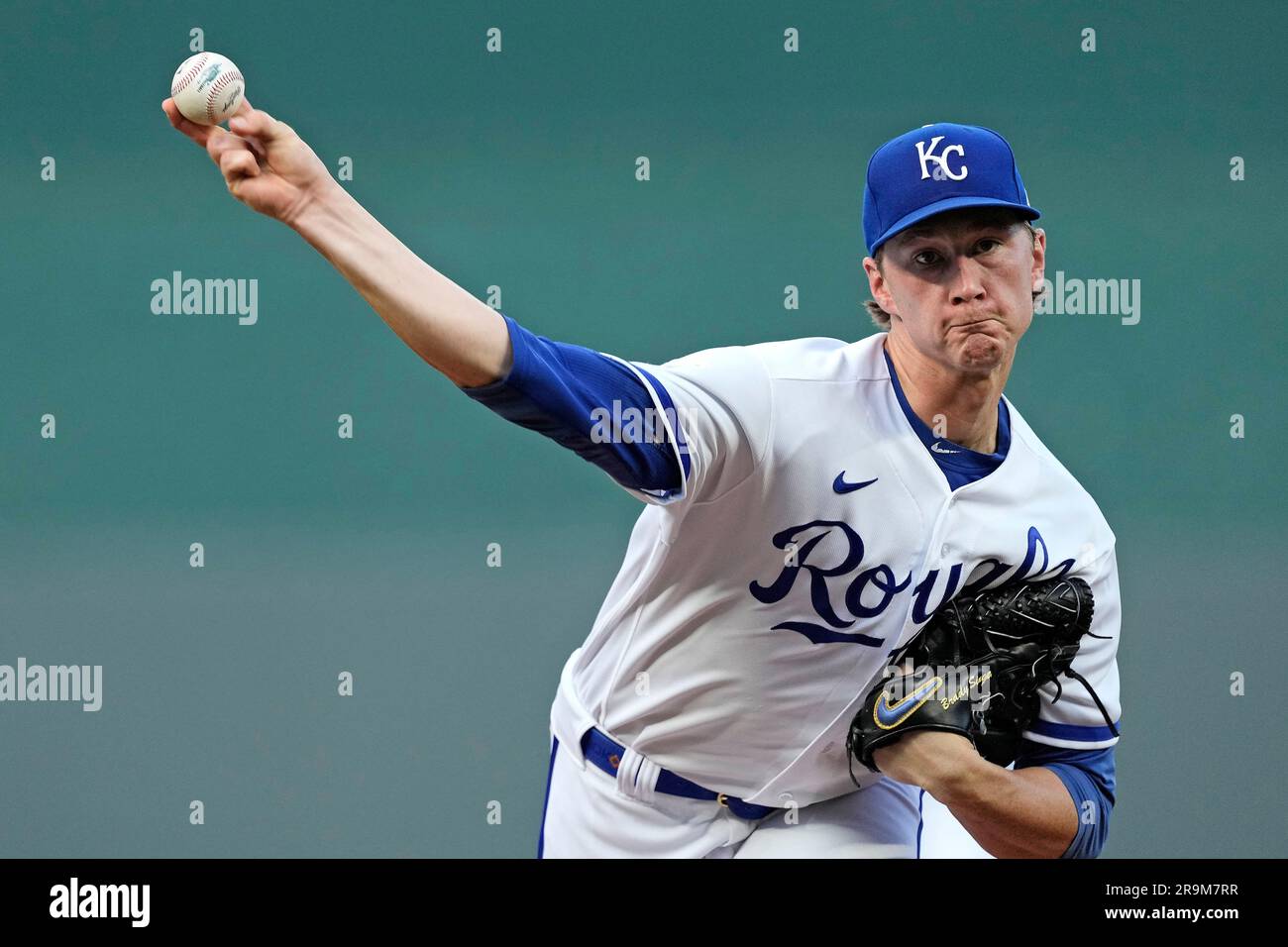 Kansas City Royals starting pitcher Brady Singer throws during the