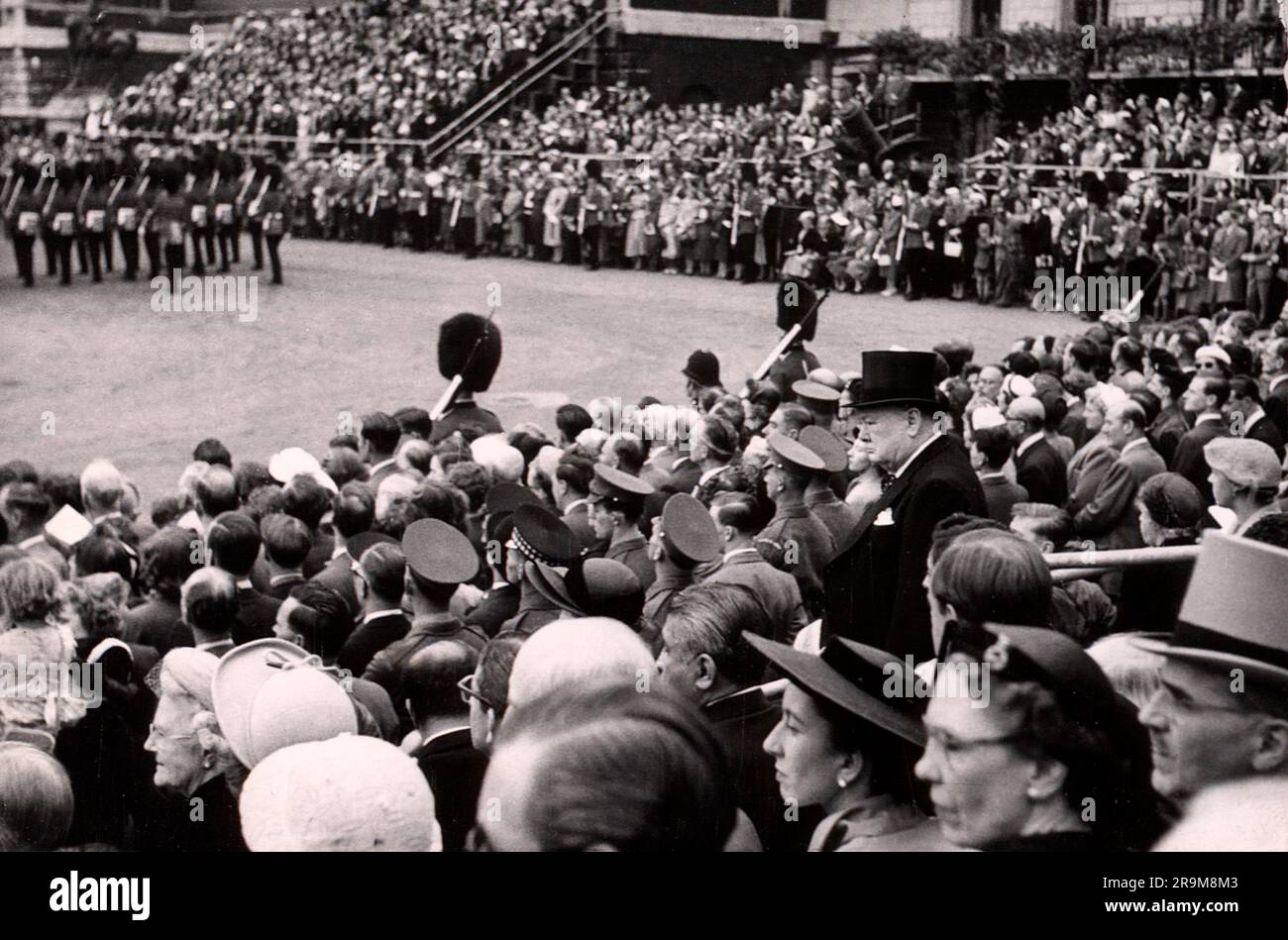 British Prime Minister Winston Churchill amongst crowd during Trooping the Colour ceremony, London, England, UK, Toni Frissell, June 1953 Stock Photo