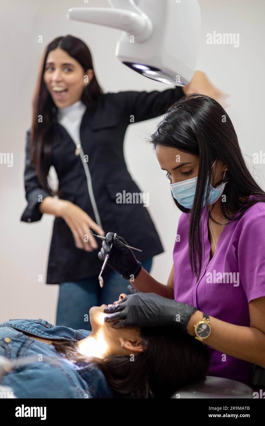 dental office, workplace health professions, health and wellness, female doctor working with a