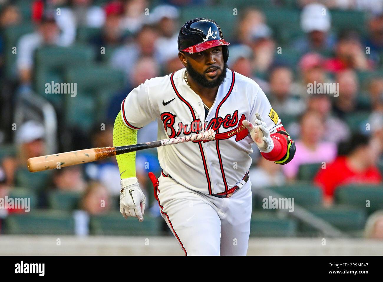 ATLANTA, GA – JUNE 27: Atlanta designated hitter Marcell Ozuna (20) runs to  first after hitting a single during the MLB game between the Minnesota  Twins and the Atlanta Braves on June