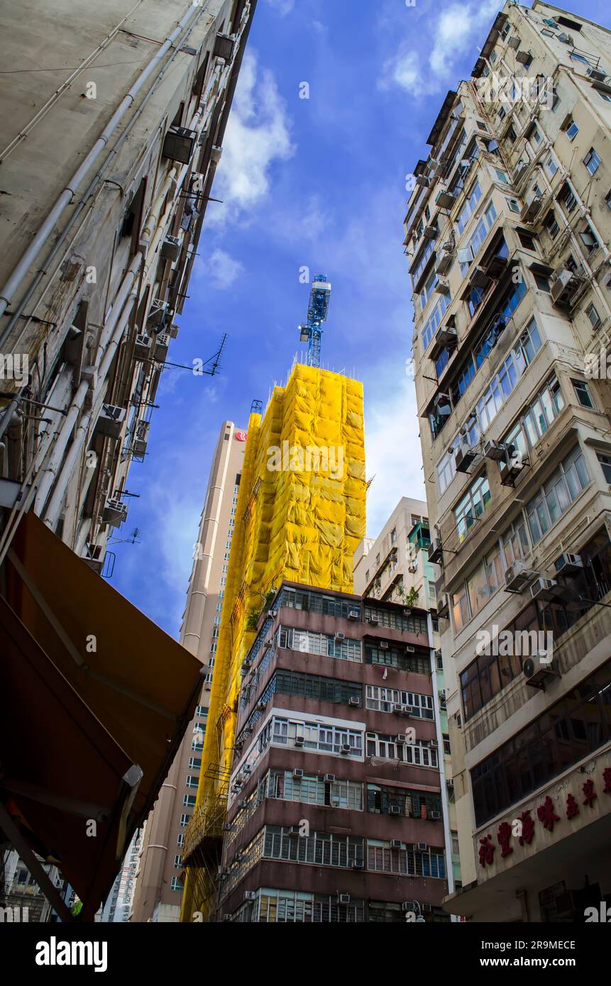 New buildings under construction covered with tradtional Chinese bamboo scaffolding, Hong Kong, China. Stock Photo