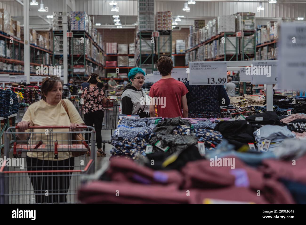 Customers seen shopping at Costco. The photo provide a visual glimpse