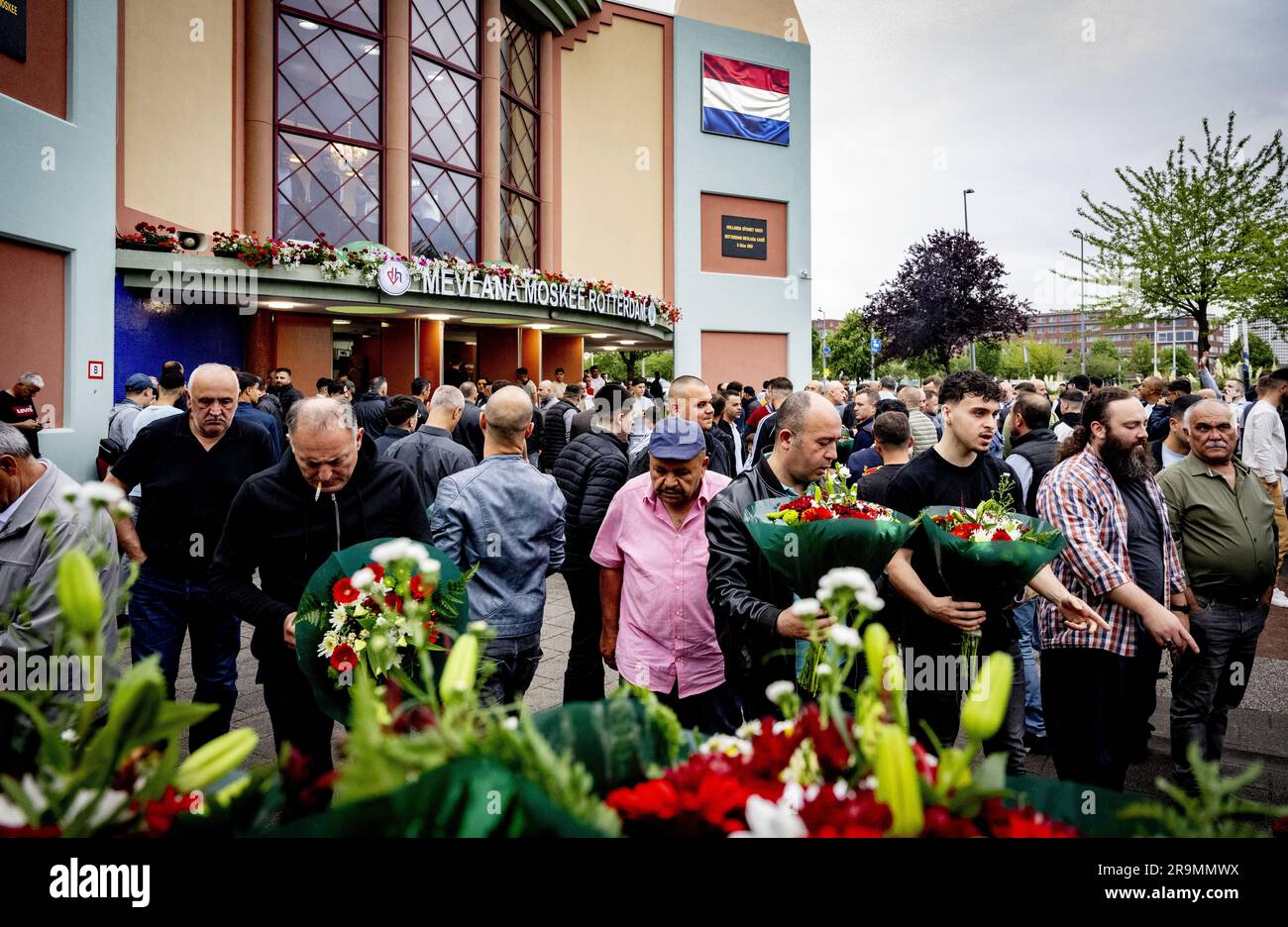 Rotterdam Islam ROTTERDAM - Muslims after morning prayer in the Mevlana Mosque. This is ...