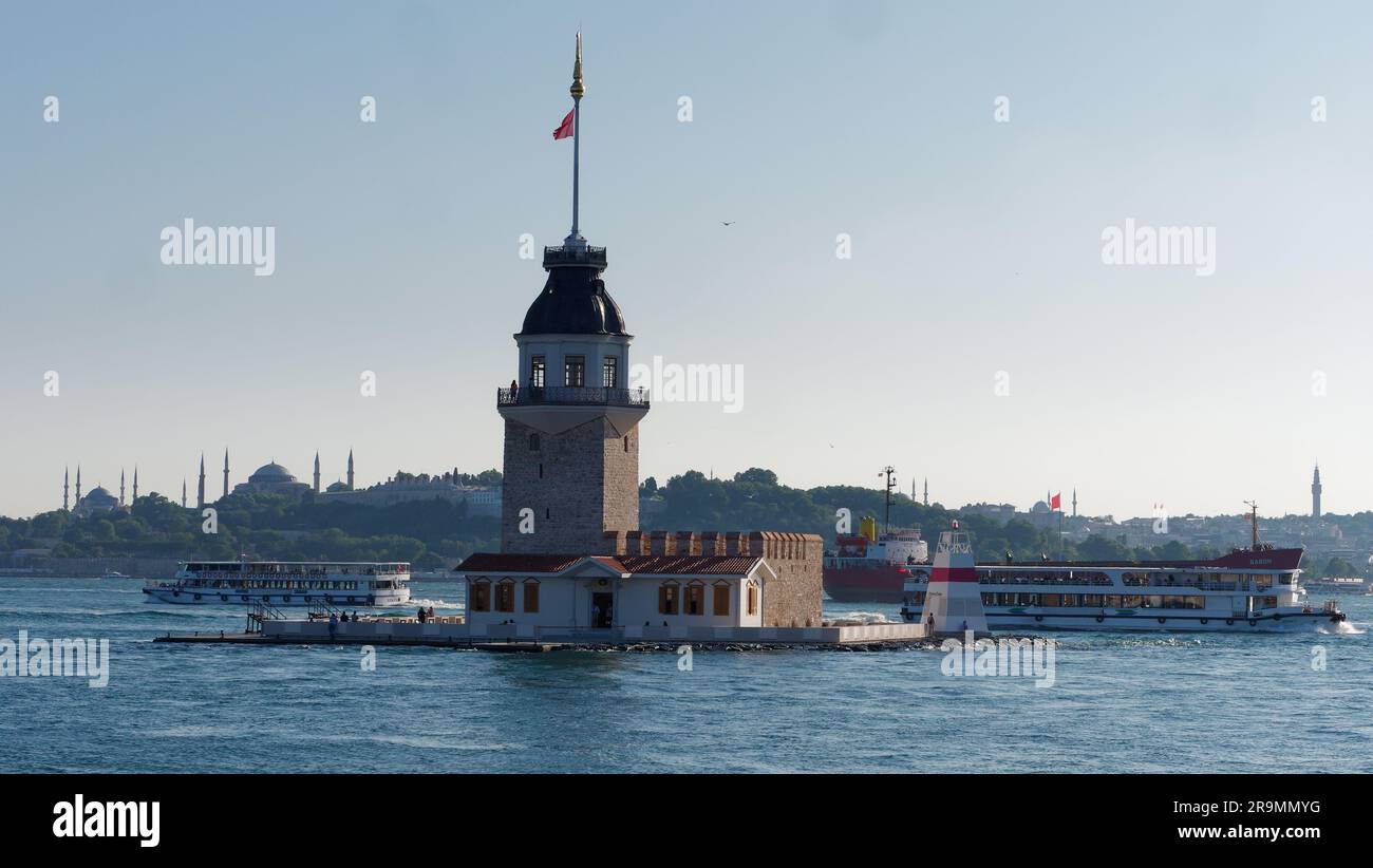 Maidens Tower on the Bosporus aka Bosphorus Sea in Istanbul Turkey. Behind on the European side is the Topkapi Palace, Hagia Sophia and Blue Mosque. Stock Photo