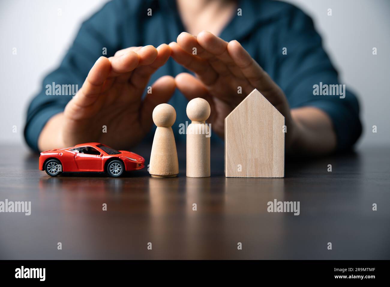Insurance is aa kind protection, security safety concept. The insurance is a business investment. The symbol of insurance are house roof, car. under u Stock Photo