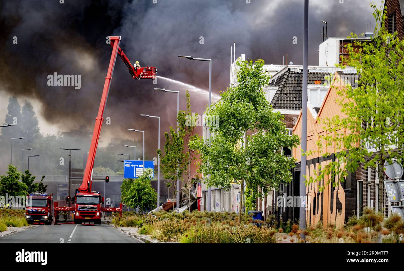 ROTTERDAM The fire brigade extinguishes a large fire in a shed on