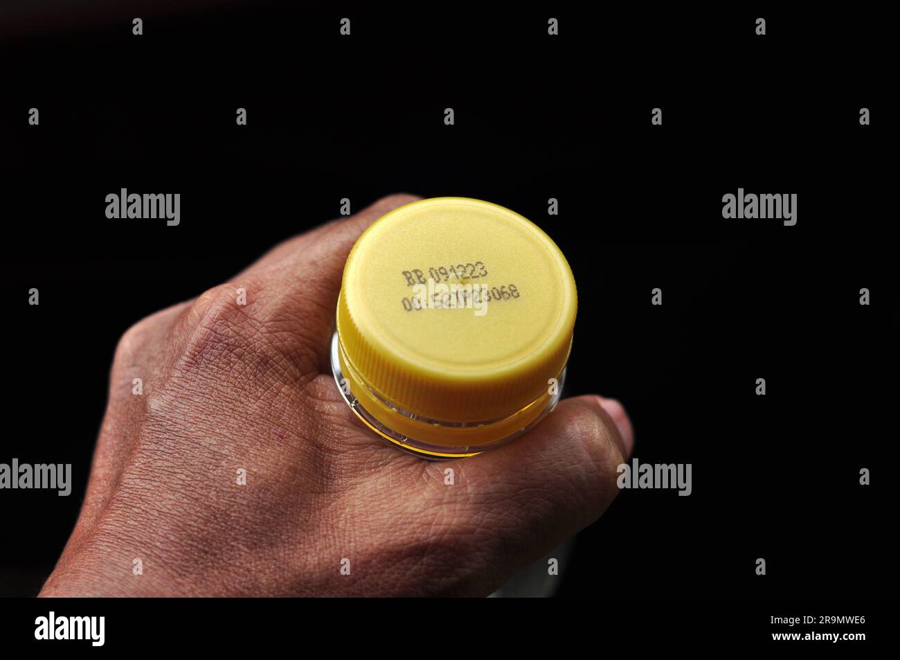 Expiry date written on the plastic bottle cap Stock Photo Alamy