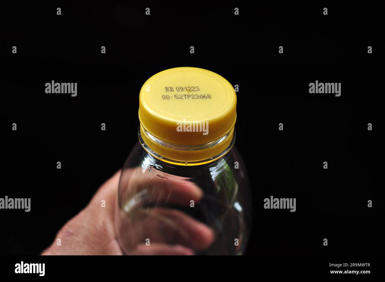 Expiry date written on the plastic bottle cap Stock Photo Alamy