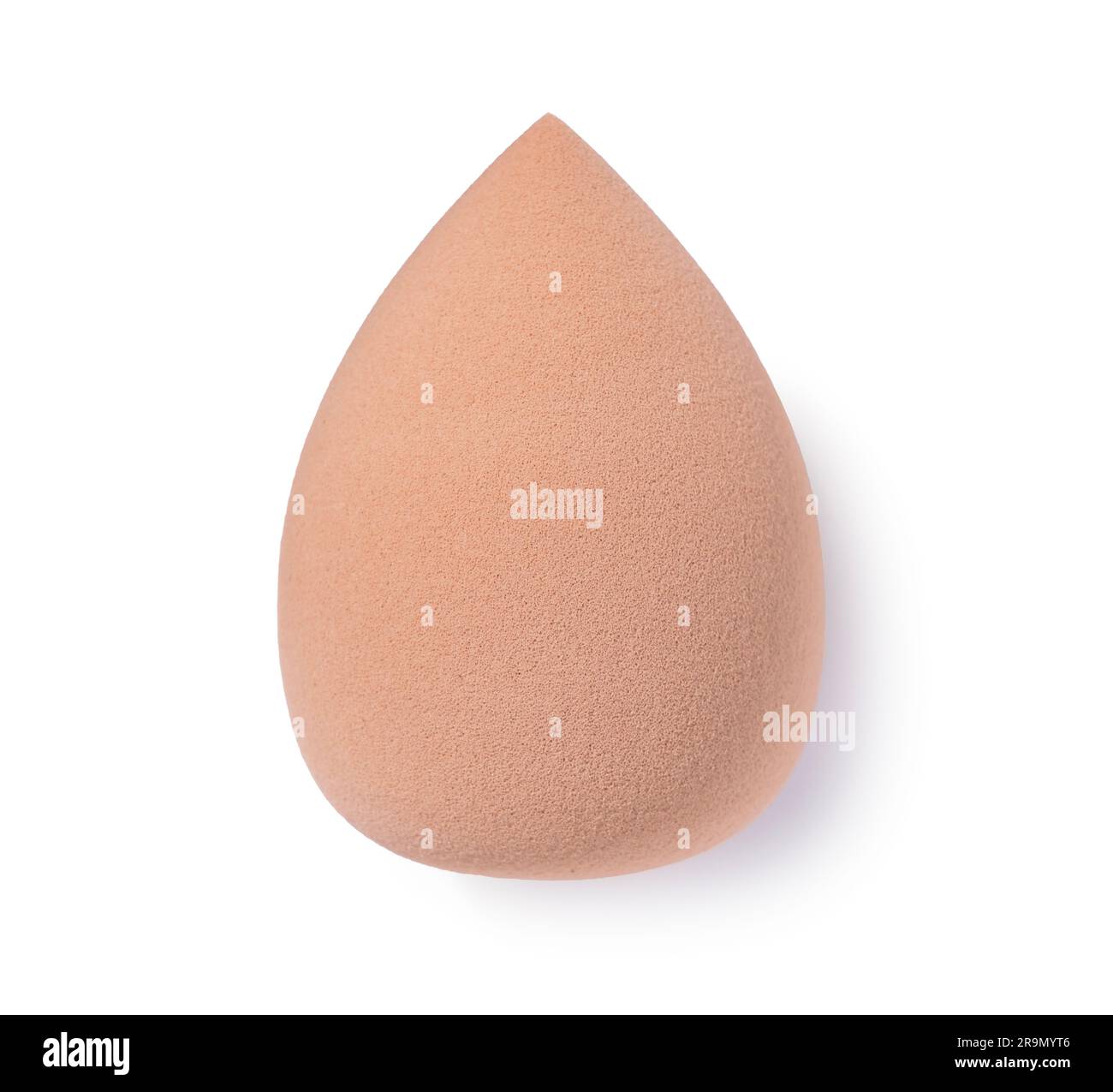 An eggshaped makeup sponge placed on a white background Stock Photo