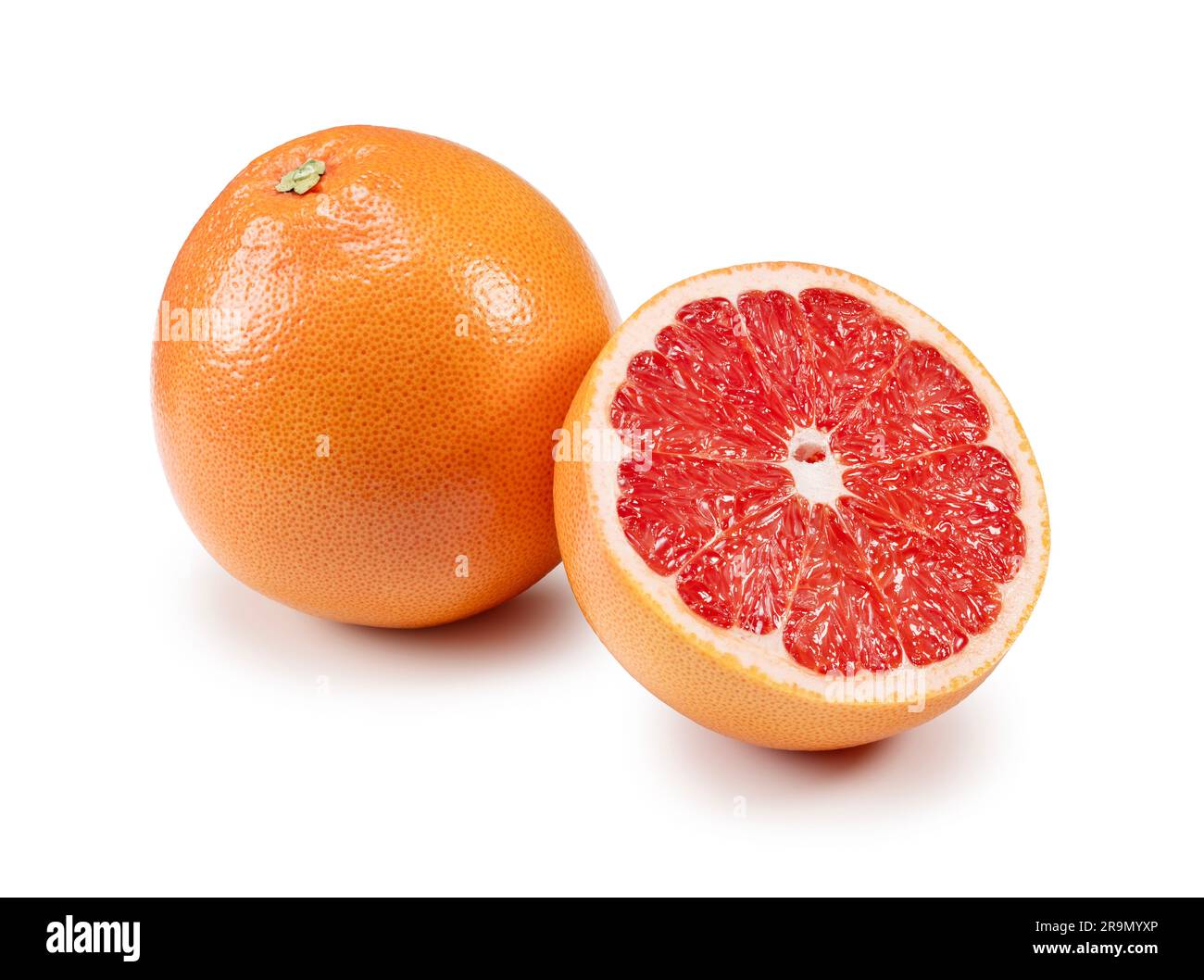 Cut grapefruit placed on a white background. Stock Photo