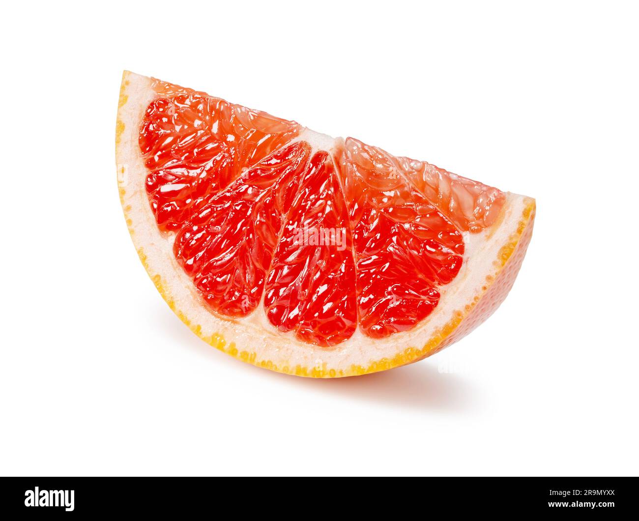 Cut grapefruit placed on a white background. Stock Photo