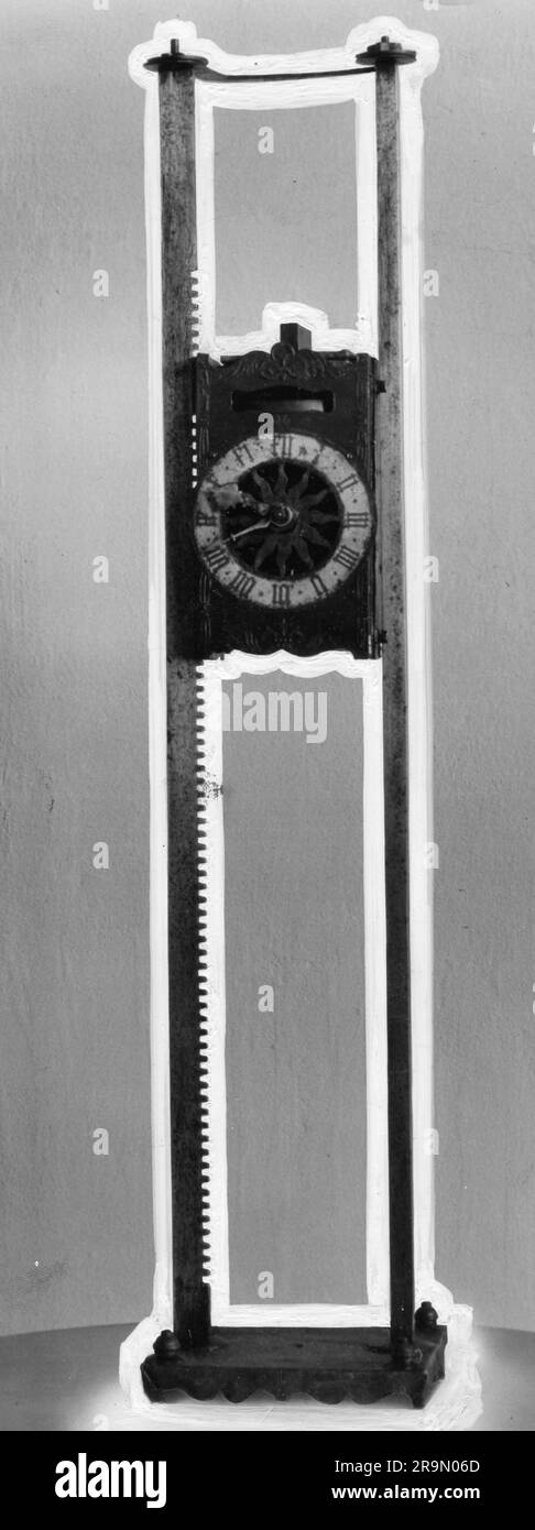 clock, hall clock, iron saw clock, ADDITIONAL-RIGHTS-CLEARANCE-INFO-NOT-AVAILABLE Stock Photo