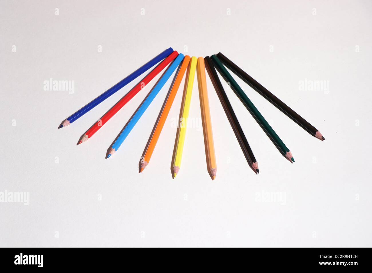 https://c8.alamy.com/comp/2R9N12H/vibrant-inspiration-unleashed-explore-the-spectrum-of-color-with-our-multi-colored-pencils-and-sharpener-stock-image!-2R9N12H.jpg