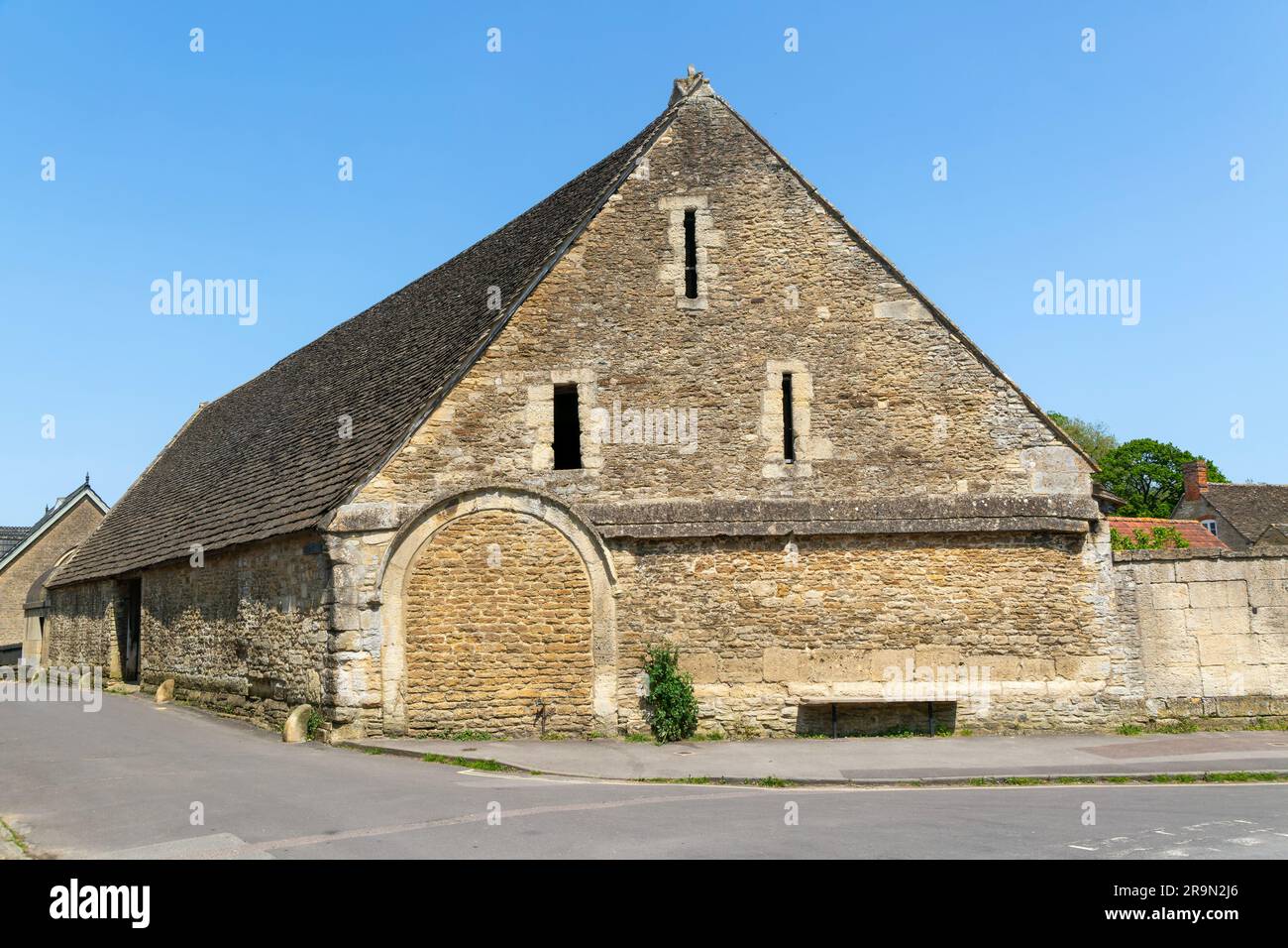 Historic tithe barn in the village of Lacock, Wiltshire, England, UK