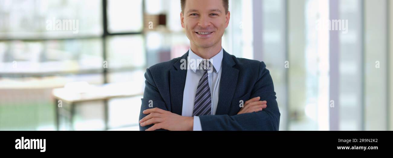 Portrait of smiling successful businessman with arms crossed Stock ...