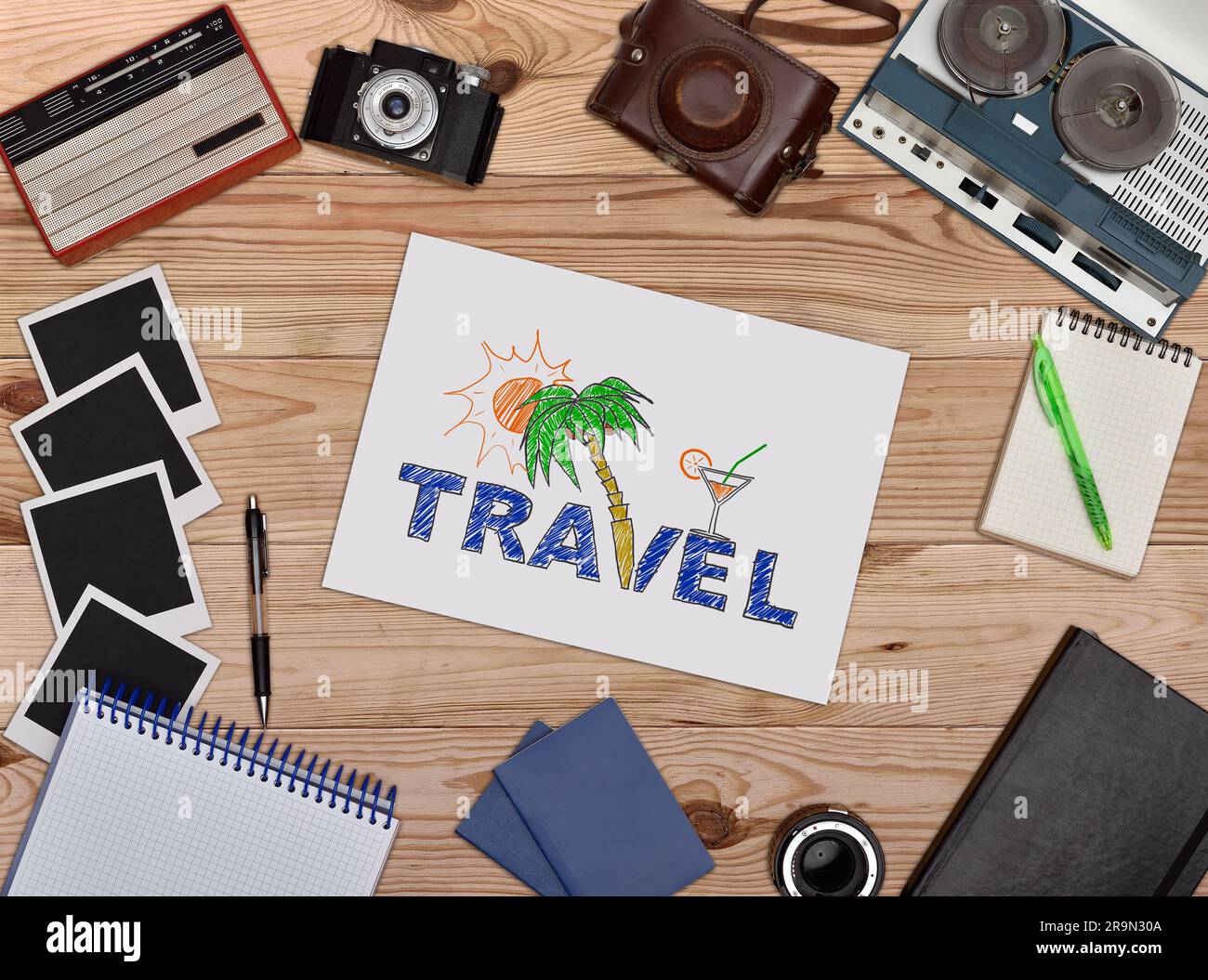 Paper with drawing travel concept. Old retro object on wooden table Stock Photo