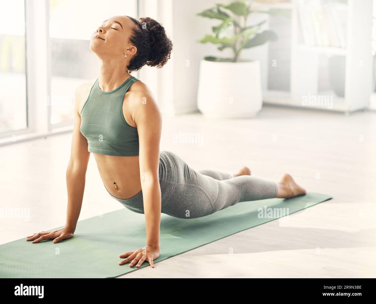 Yoga mat, stretching and woman body on living room floor for wellness ...