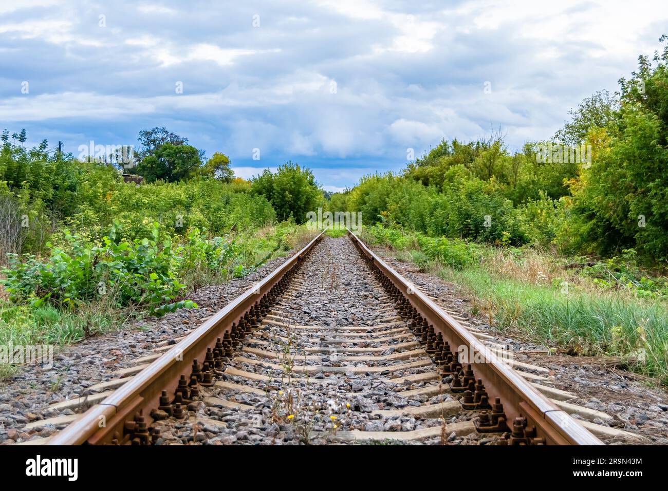 Photography to theme railway track after passing train on railroad, photo consisting of long