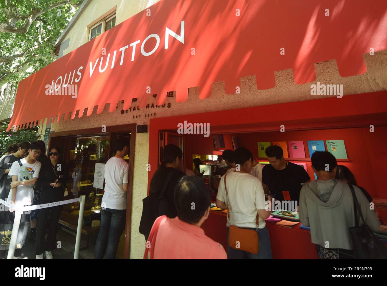 SHANGHAI, CHINA - JUNE 28, 2023 - People line up to buy Louis