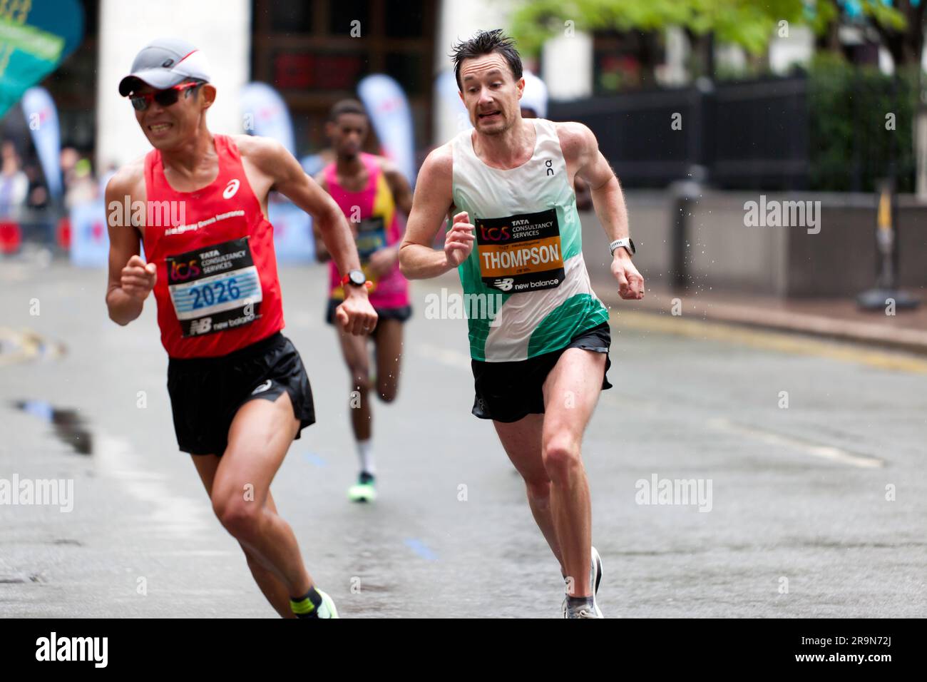 Chris Thompson (GBR) passing through Cabot Square, he went on to finish 2nd in his category, in a time of  02:11:50, in the 2023, Men's Elite London Marathon Stock Photo