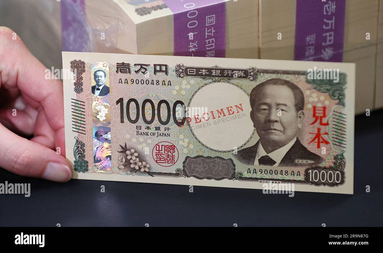Japanese tenthousand yen note (sample) is shown to the media at the