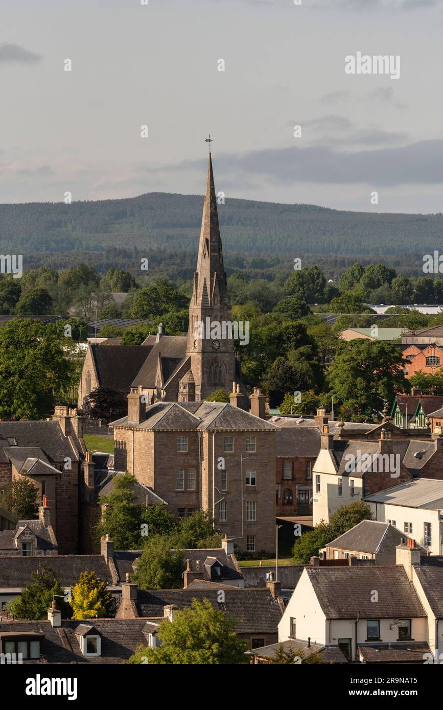 Invergordon, Scotland, UK.  3 June 2023.  The spire of  The Church of Scotland towers above the small coastal town of Ivergordon gateway to The Highlands. Stock Photo
