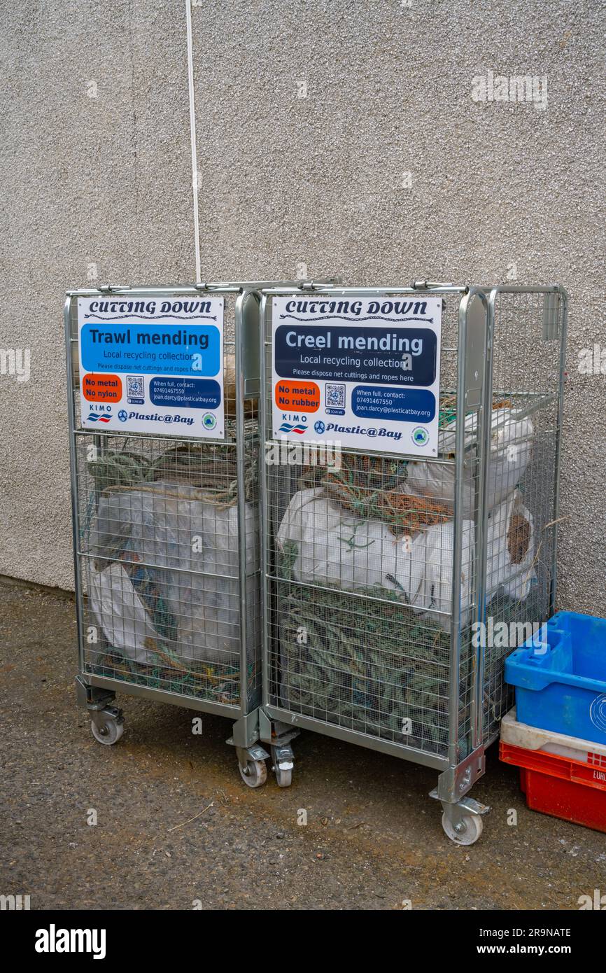 Cages for waste fishing gear at Stornoway harbour Stock Photo