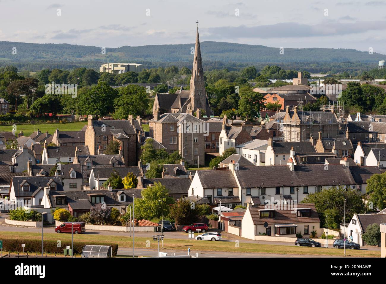 Invergordon, Scotland, UK.  3 June 2023.  The spire of  The Church of Scotland towers above the small coastal town of Ivergordon gateway to The Highlands. Stock Photo