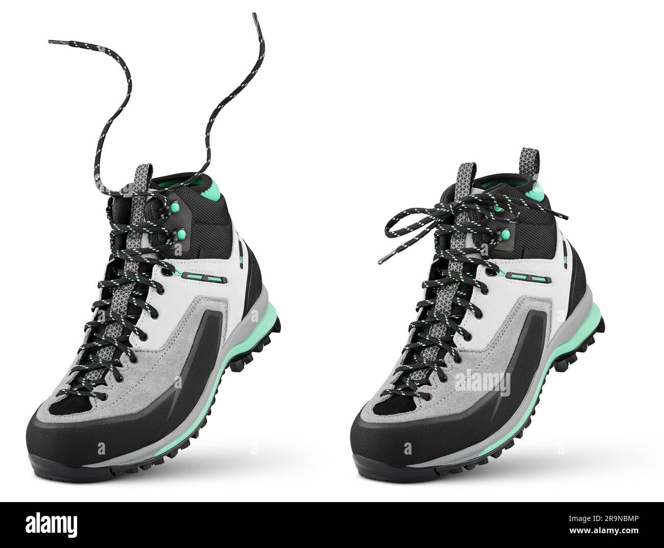 New sports hiking boot with flying laces stands on the tip isolated on white background. Winter