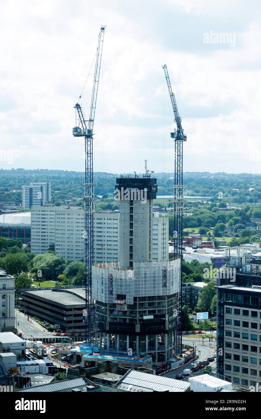 The Octagon building in Birmingham City Centre under construction in June 2023. Octagon is a 155 m tall, 49-storey residential skyscraper under construction in Birmingham, England. The building is part of the Paradise redevelopment scheme in the city centre and is designed by Glenn Howells Architects. Stock Photo