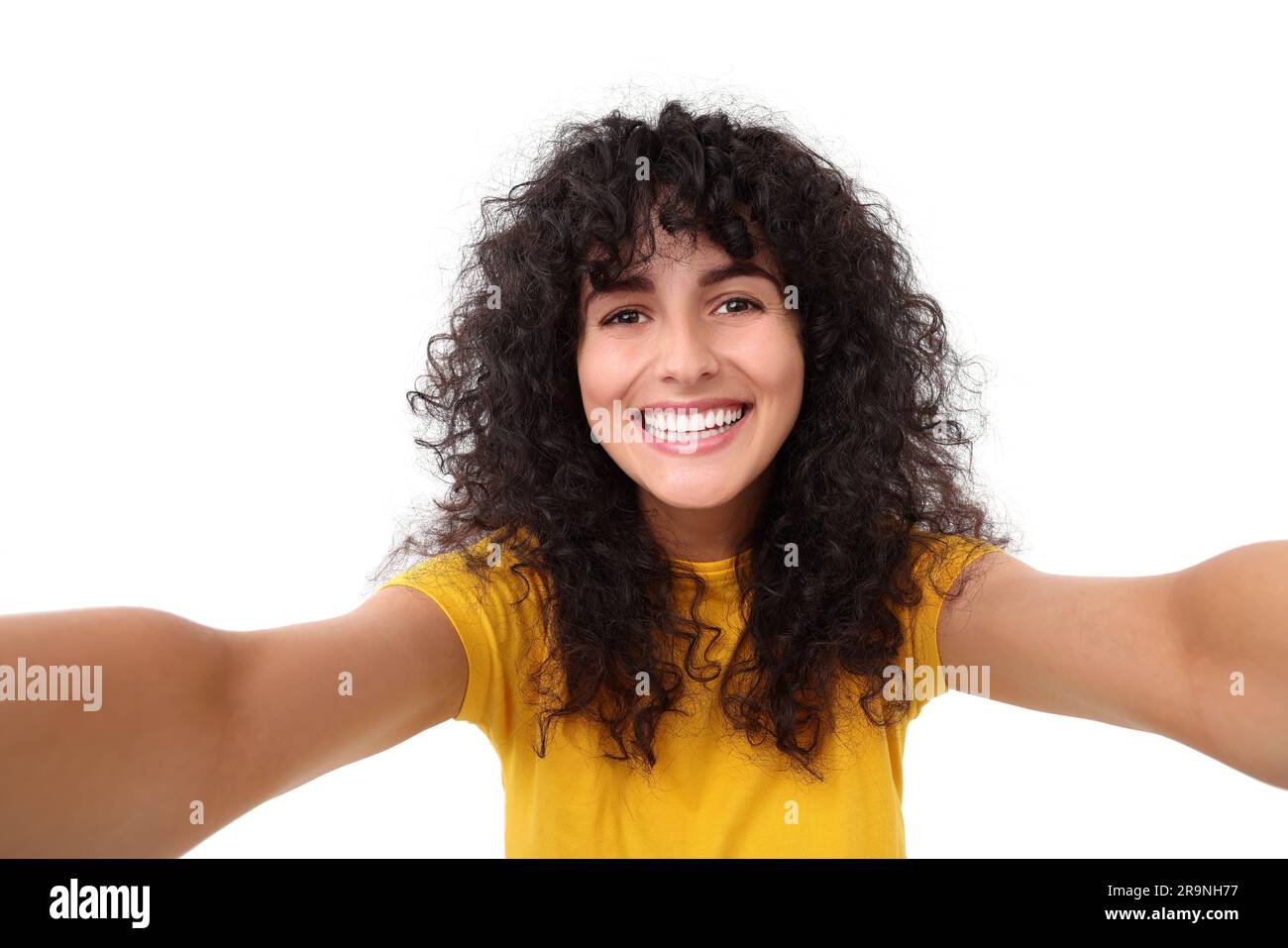 Beautiful young woman taking selfie on white background Stock Photo - Alamy