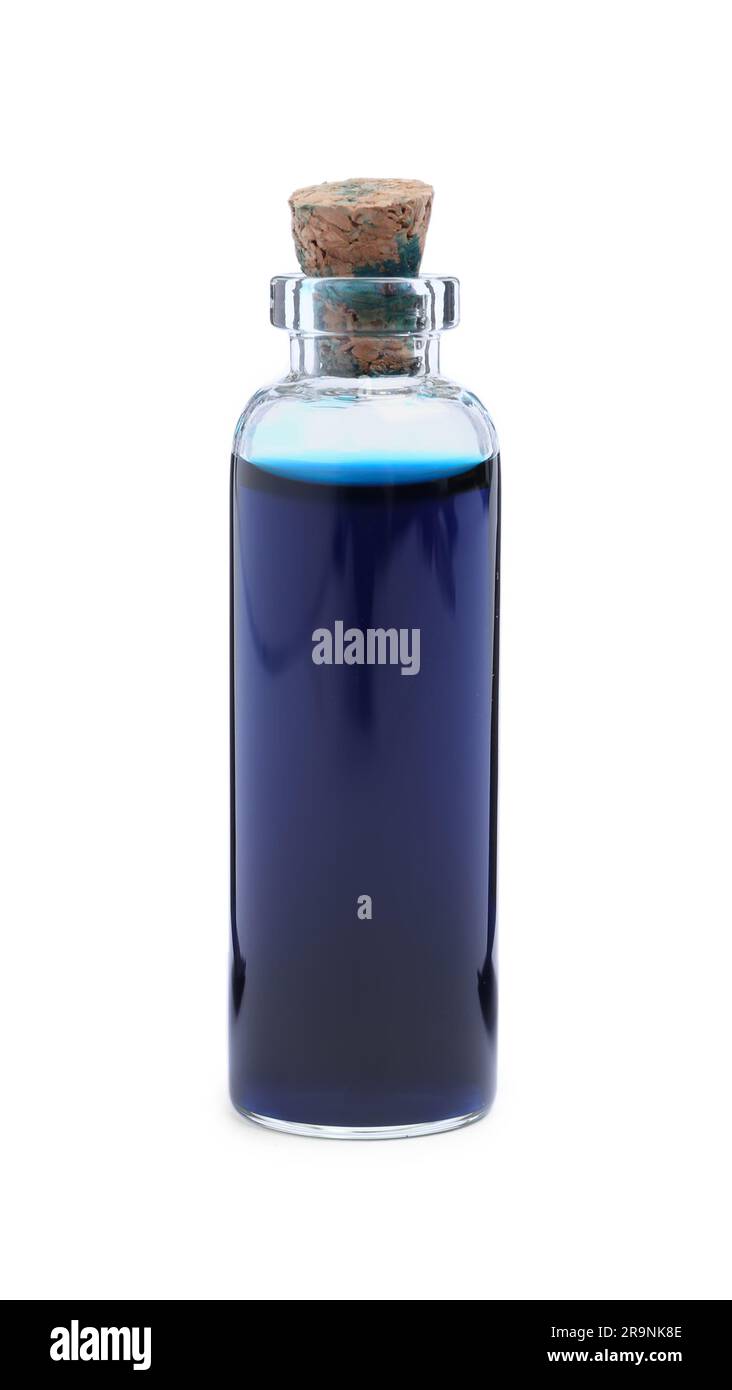 Glass bottle of blue food coloring on white background Stock Photo - Alamy