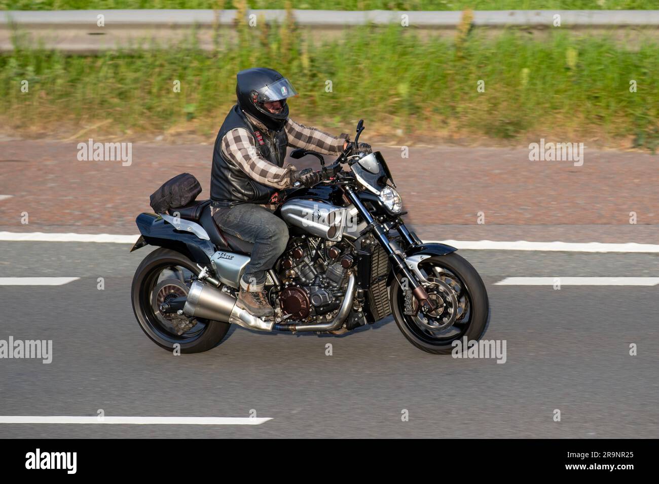 Yamaha VMAX V-Max motorcycle; travelling at speed on the M6 motorway in Greater Manchester, UK Stock Photo