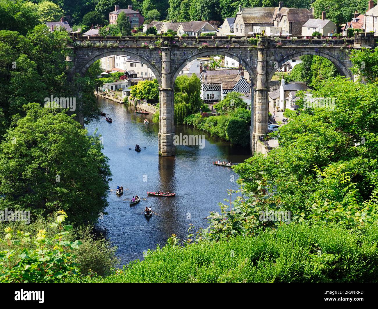 Railway viaduct over the River Nidd viewed from the castle grounds at Knaresborough North Yorkshire England Stock Photo