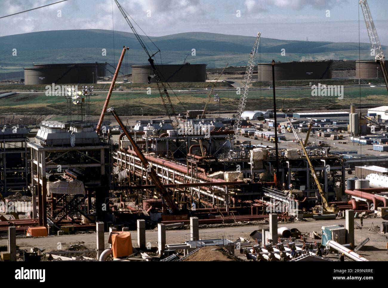 North Sea oil at Sullom Voe Terminal under construction. Oil storage tanks for British Petroleum (BP). Sullom Voe, Shetlands Mainland, Shetland Islands, Scotland, circa 1979. UK 1970S HOMER SYKES Stock Photo