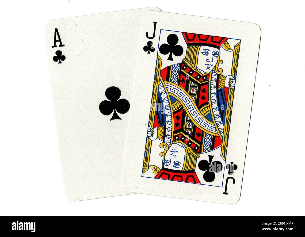 Vintage playing cards showing an ace of clubs and a jack of clubs on a ...