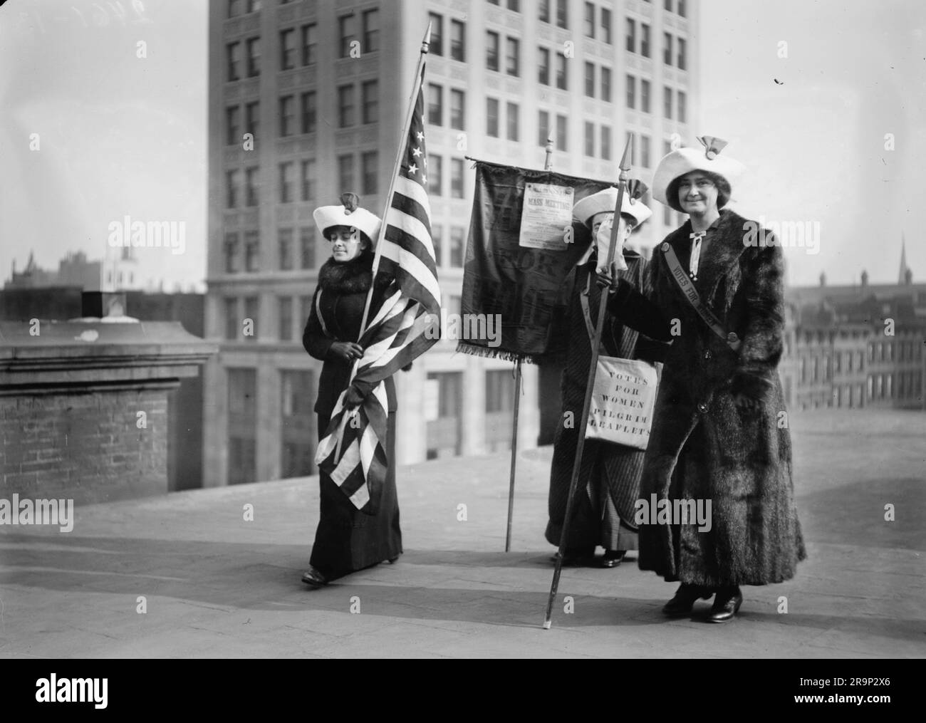 American suffragettes with a flag, taken in New York. Stock Photo