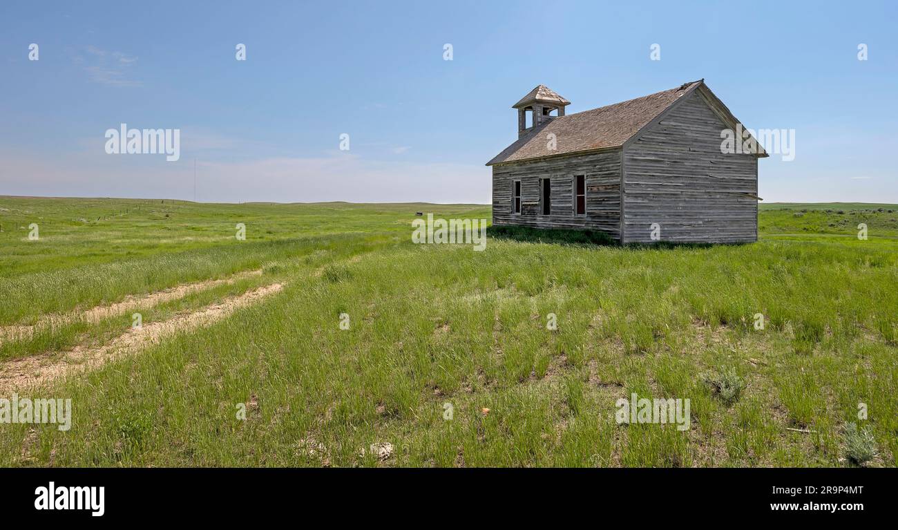 Old wooden clapboard Cottonwood Lutheran Church on the Great Plains near Havre, Montana, USA Stock Photo