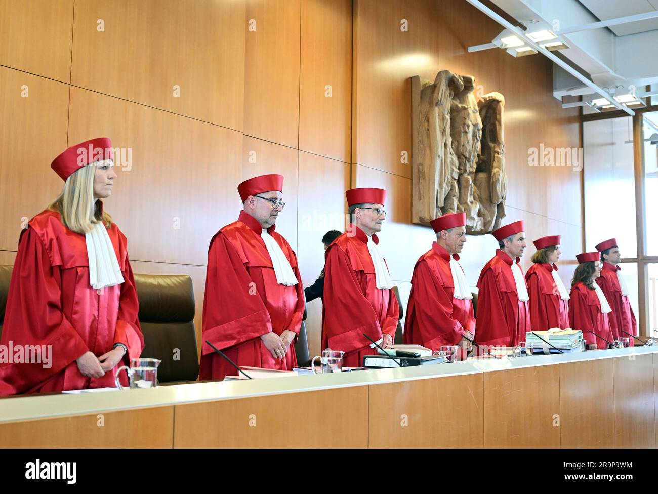 Karlsruhe, Germany. 28th June, 2023. The First Senate of the Federal Constitutional Court, Miriam Meßling (l-r), Heinrich Amadeus Wolff, Henning Radtke, Josef Christ, Stephan Harbarth, Chairman of the Senate and President of the Court, Yvonne Ott, Ines Härtel and Martin Eifert, opens the oral proceedings on report cards for dyslexics. The question at issue is whether dyslexics must accept a report card stating that their spelling performance was not included in their grades. Credit: Uli Deck/dpa/Alamy Live News Stock Photo