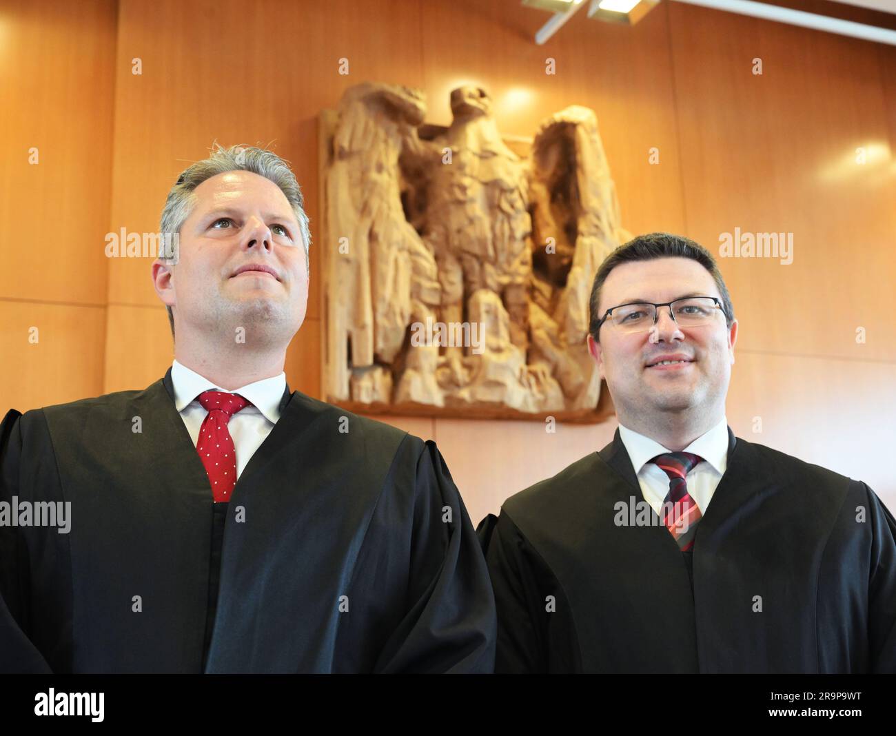 Karlsruhe, Germany. 28th June, 2023. Thomas Schneider (r) and Fabian Scheunemann, representatives of complainants on constitutional complaints in the matter of 'Zeugnisvermerke bei Legasthenikern' (report cards for dyslexics), are waiting at the Federal Constitutional Court for the oral proceedings to begin. At issue is the question of whether dyslexics must accept a report card noting that their spelling performance was not included in their grades. Credit: Uli Deck/dpa/Alamy Live News Stock Photo