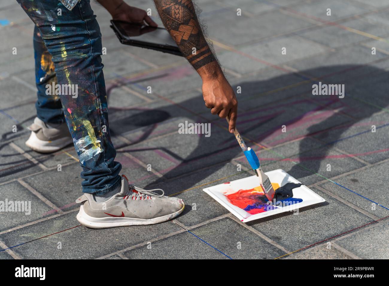 Kaiserslautern, Germany. 28th June, 2023. Artist at work, using brush