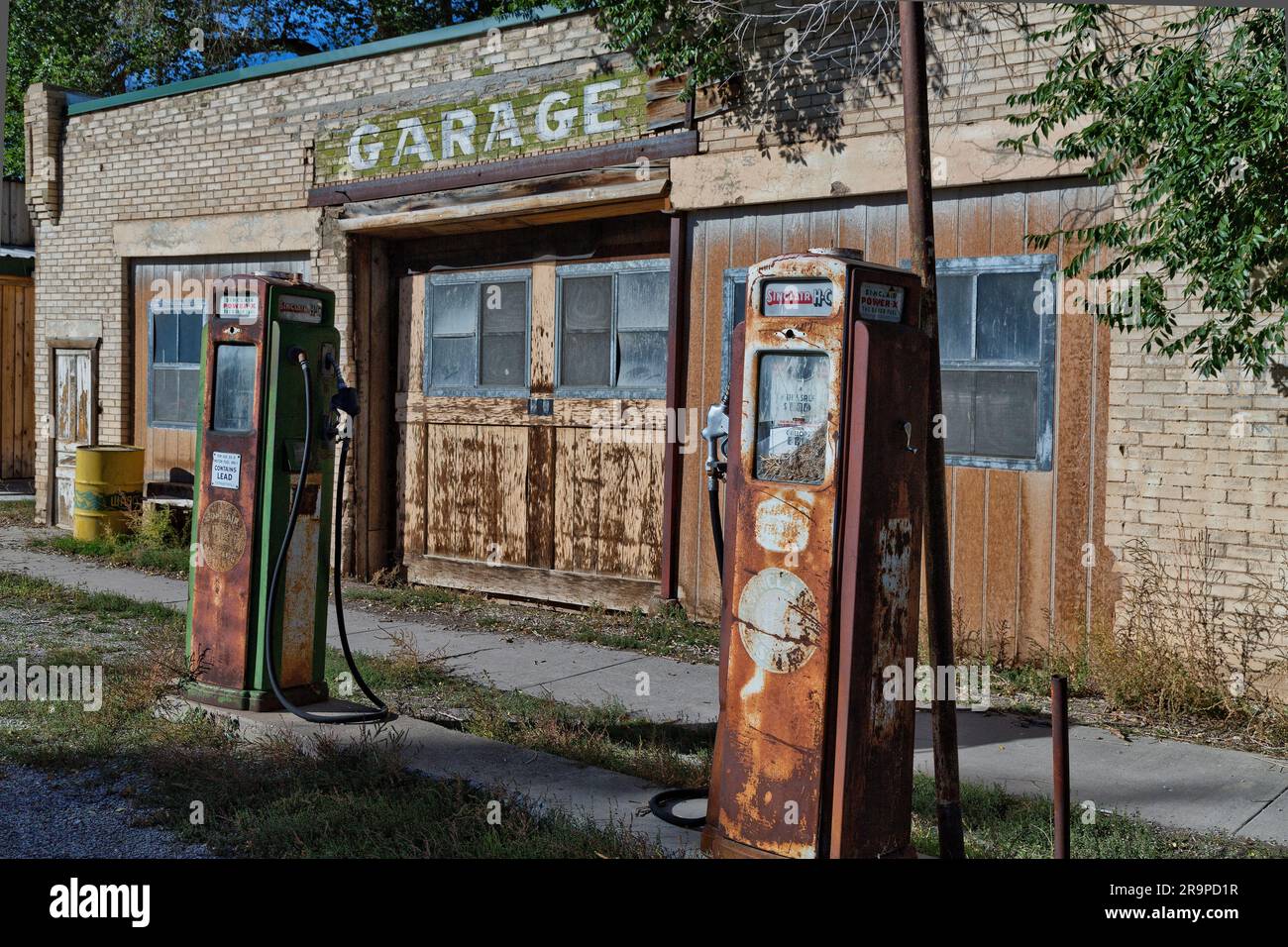 Classic Garage, Sinclair Gas Station,  HC pumps, Power X  contains lead, Scipio, Utah. Stock Photo