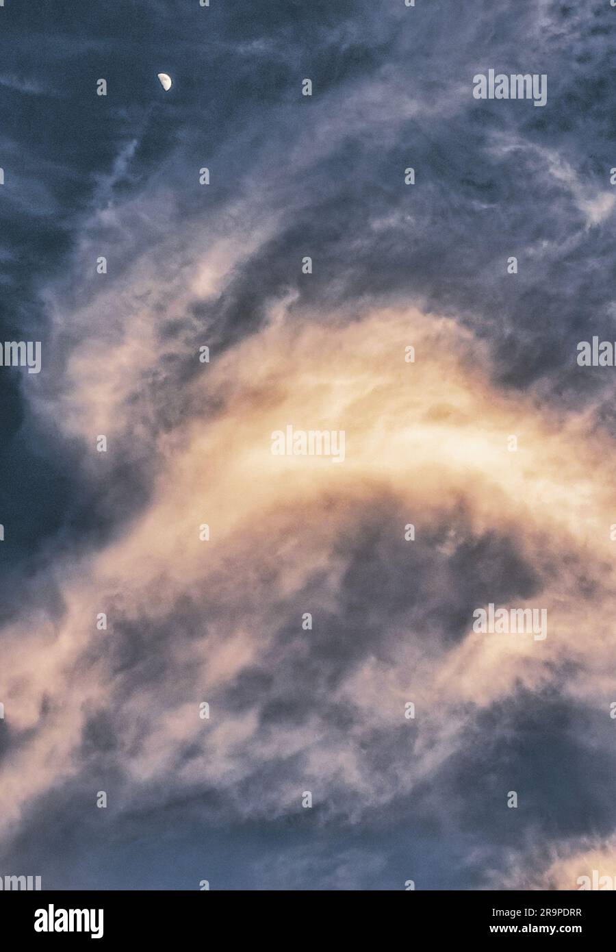 Early evening moon in a Florida sky Stock Photo