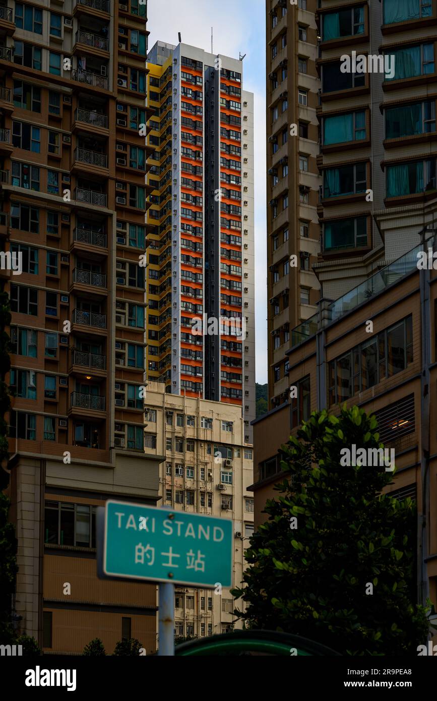 Crowded high-rise residential buildings on the streets of Hong Kong ...
