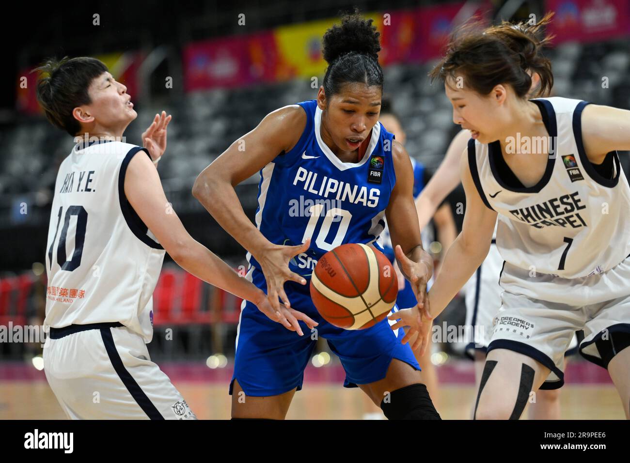 28th June 2023; The Quaycentre, Sydney Olympic Park, Sydney, NSW, Australia: FIBA Womens Asia Cup 2023, Chinese Taipei versus Philippines; Jack Animam of the Philippines catches the ball in between Ya En Han and Yu-Hsuan Wu of Chinese Taipei Stock Photo
